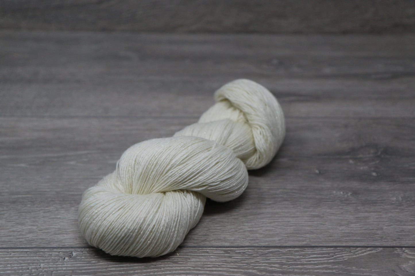 Undyed Deluxe Sock 4ply with Gold Stellina