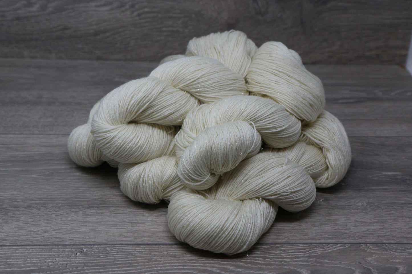 Undyed Deluxe Sock 4ply with Gold Stellina