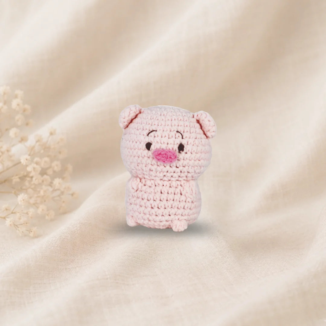 The Knitty Critters Pearl Pig Pouch Pals